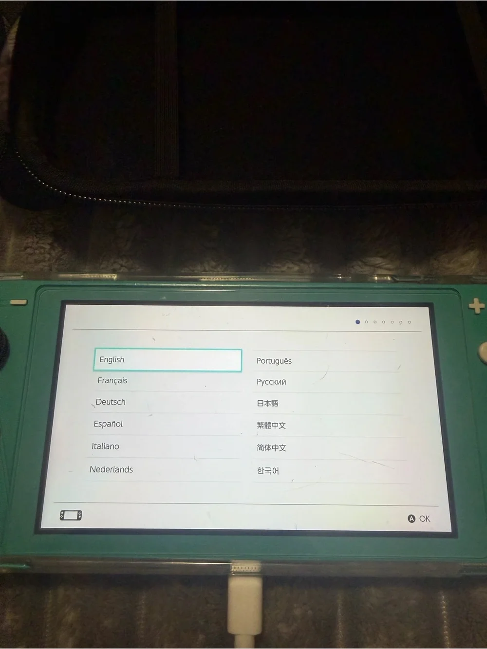 Nintendo Switch Lite Turquoise Handheld Console with Screen On